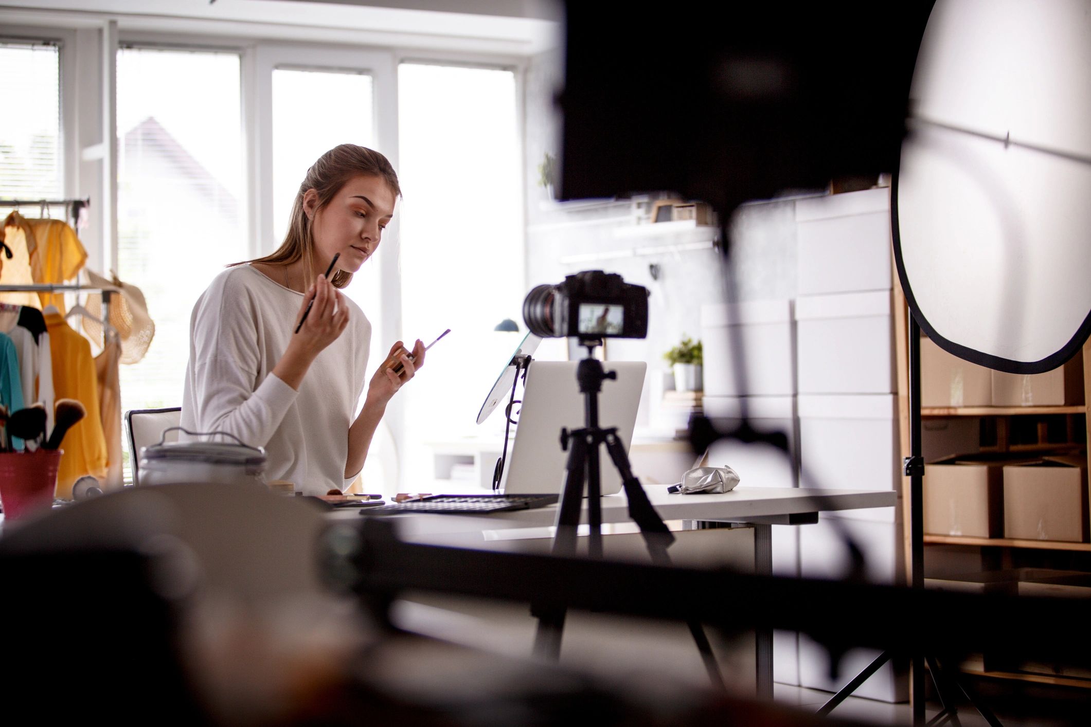 Creator in studio speaking to camera
