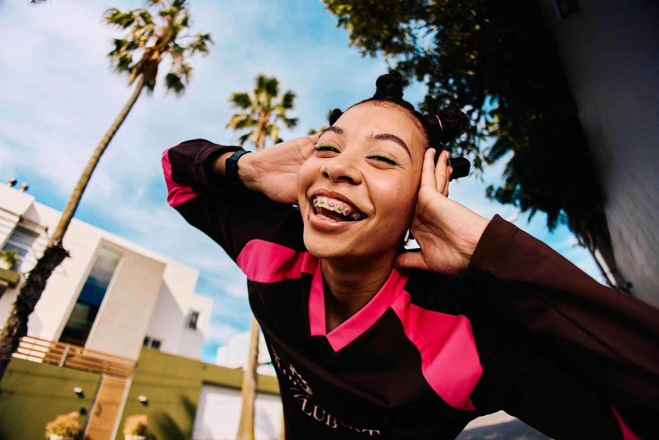 Smiling young woman with a bright expressive smile