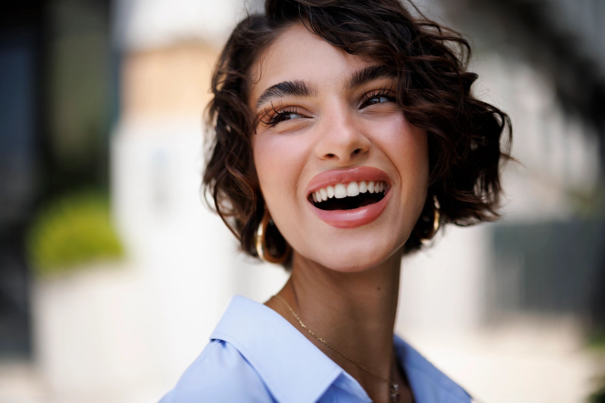 Smiling client portrait for whitening testimonial
