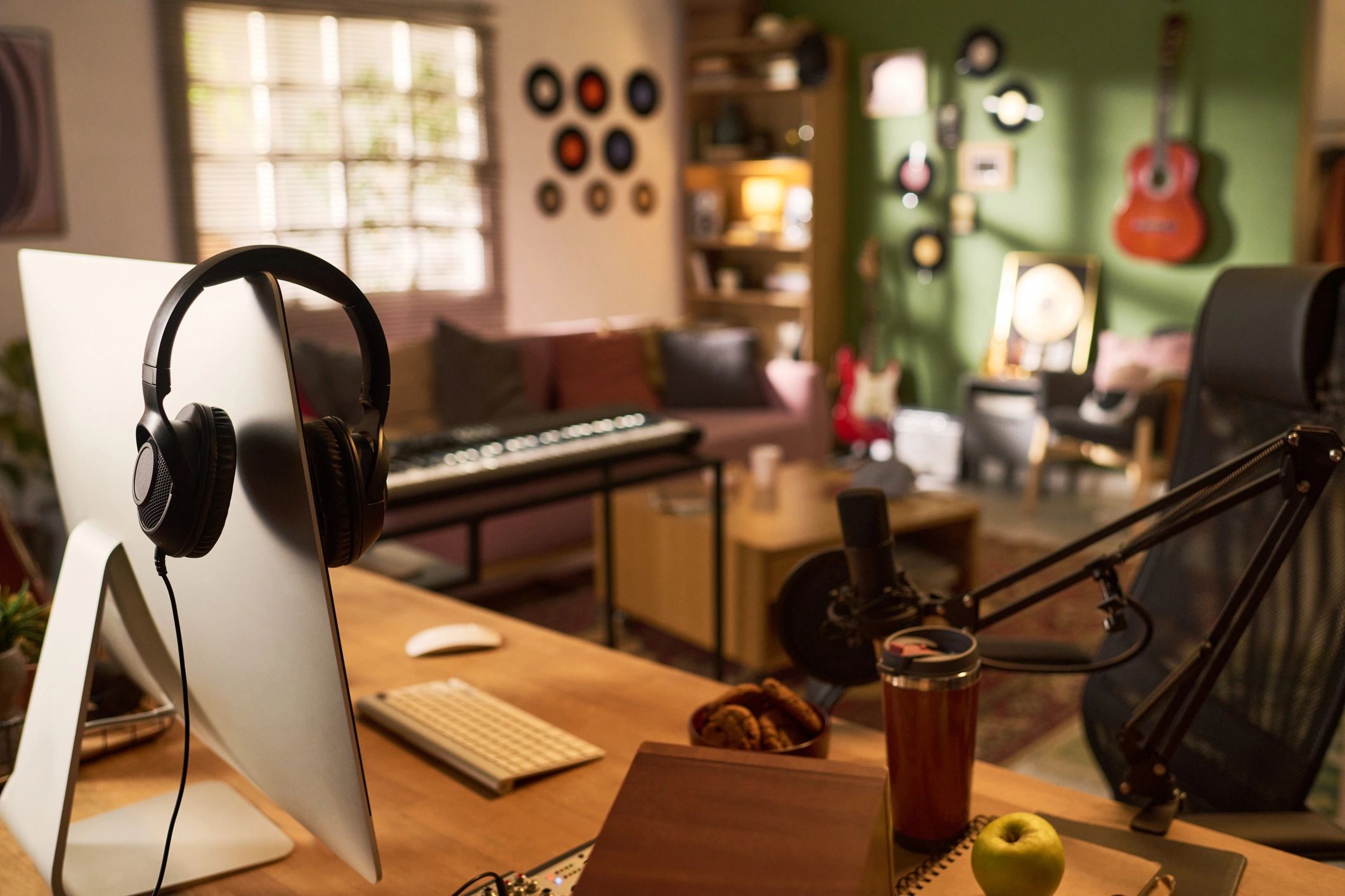 Home podcast studio setup with microphone and recording equipment